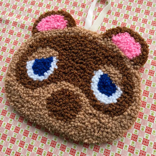 Tom Nook - handmade punch needle textile art by Courteney Textiles